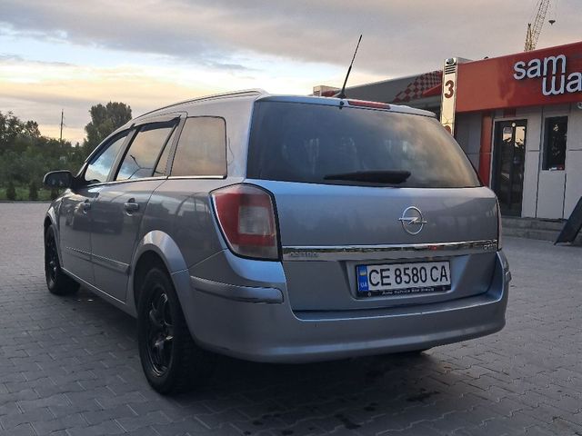 Opel Astra - фото 4