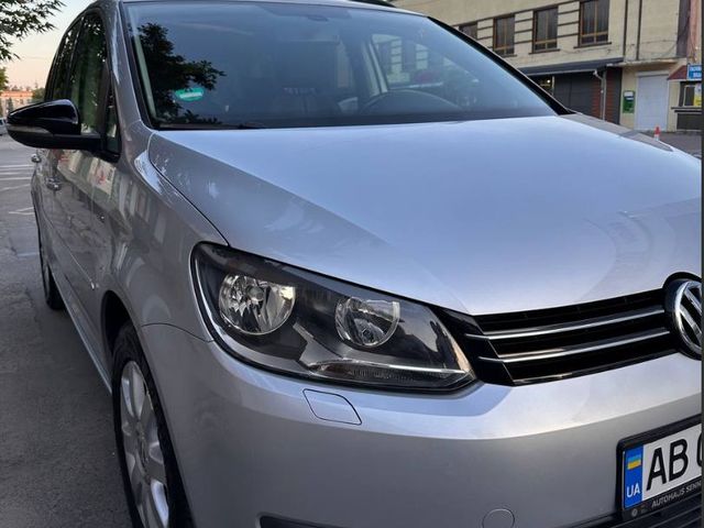 Volkswagen Touran - фото 1