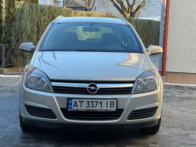 Opel Astra - фото 1