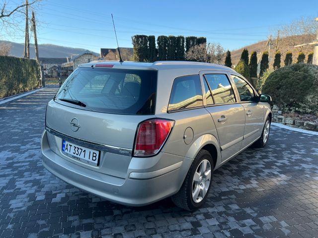 Opel Astra - фото 4