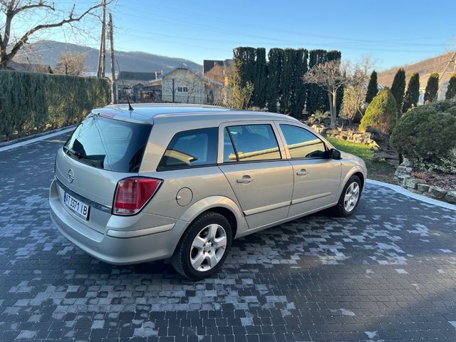 Opel Astra - фото 5