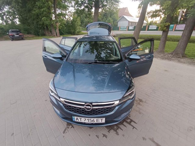 Opel Astra - фото 1
