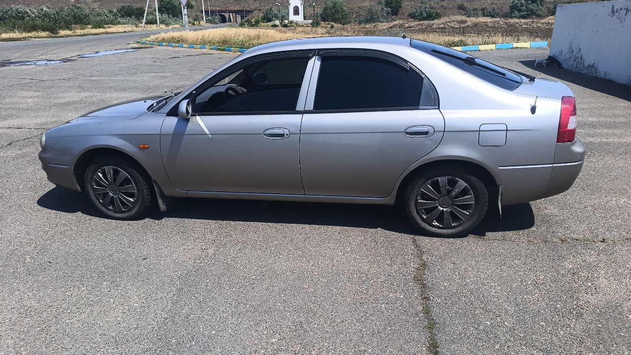 Kia Shuma - фото 4