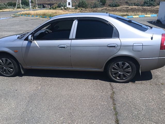 Kia Shuma - фото 4