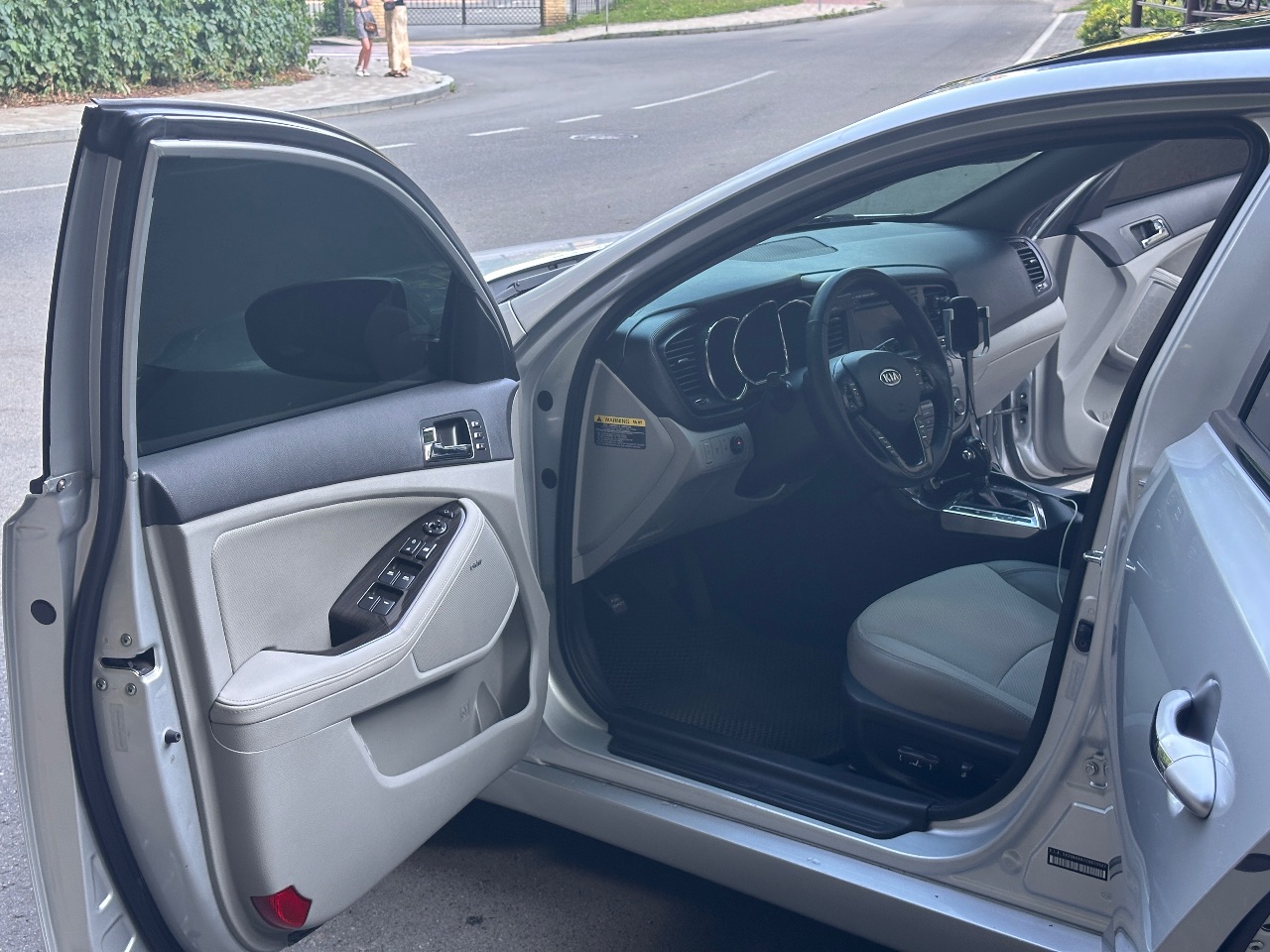Kia Optima - фото 13