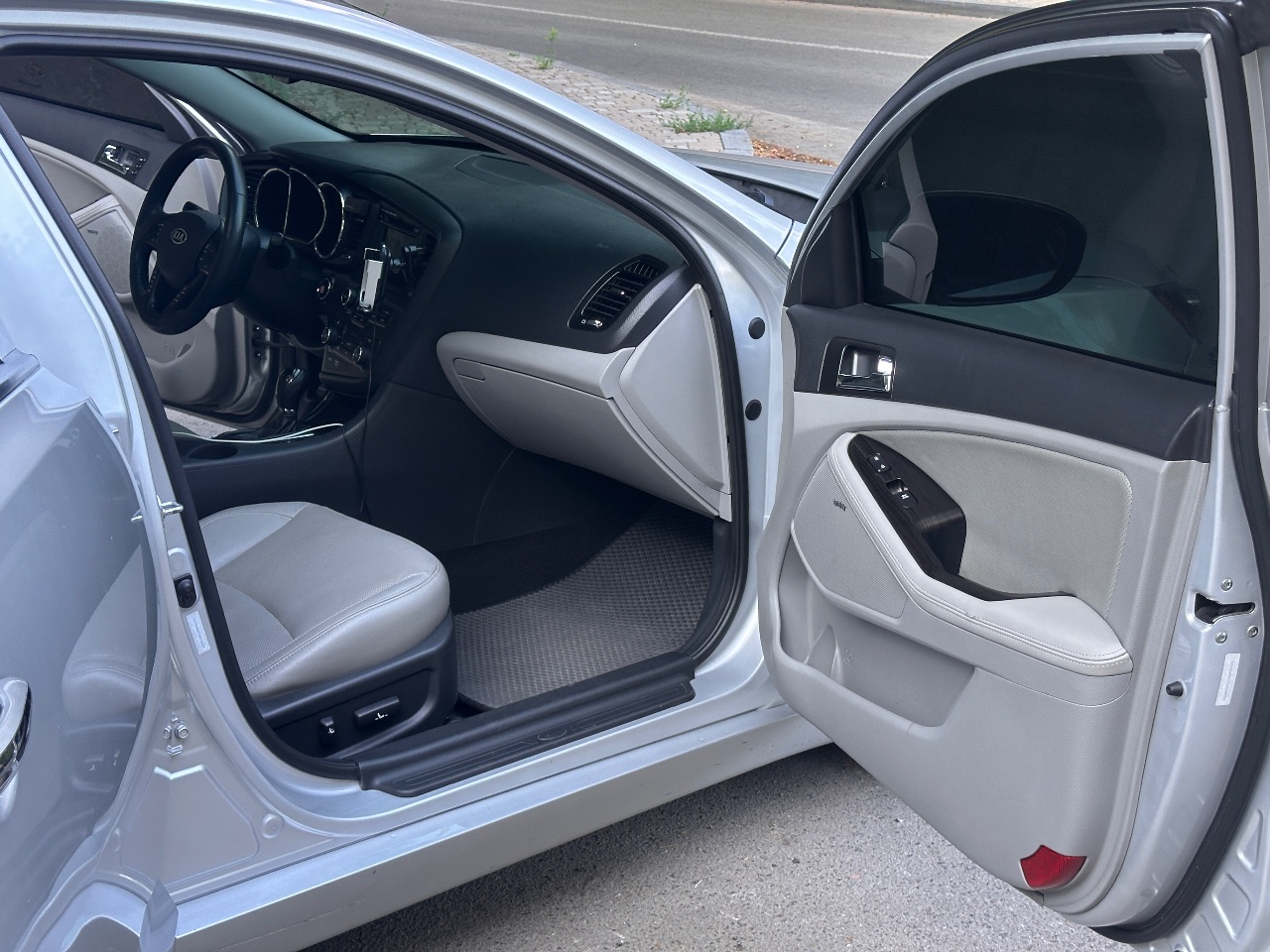 Kia Optima - фото 9