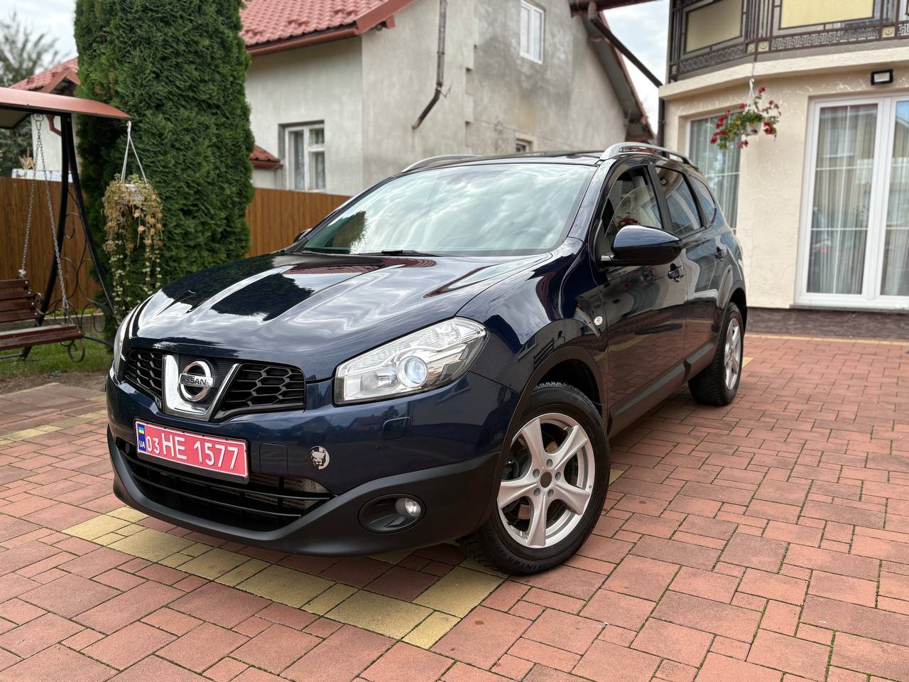 Nissan Qashqai+2 - фото 1