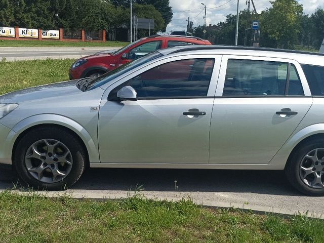 Opel Astra - фото 1
