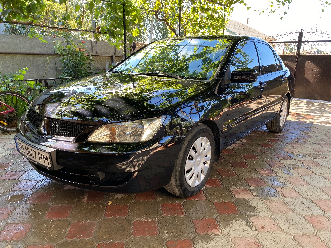 Mitsubishi Lancer - фото 4