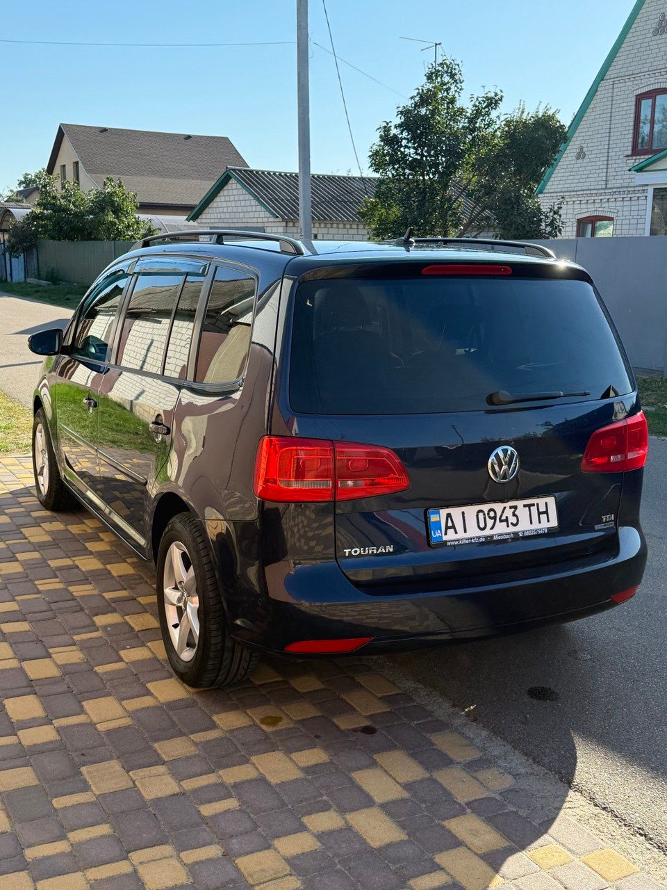 Volkswagen Touran - фото 5