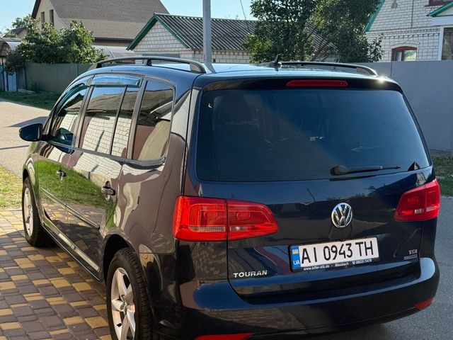 Volkswagen Touran - фото 5