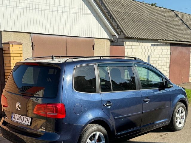 Volkswagen Touran - фото 2