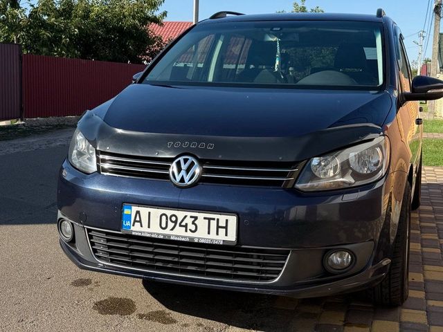 Volkswagen Touran - фото 3