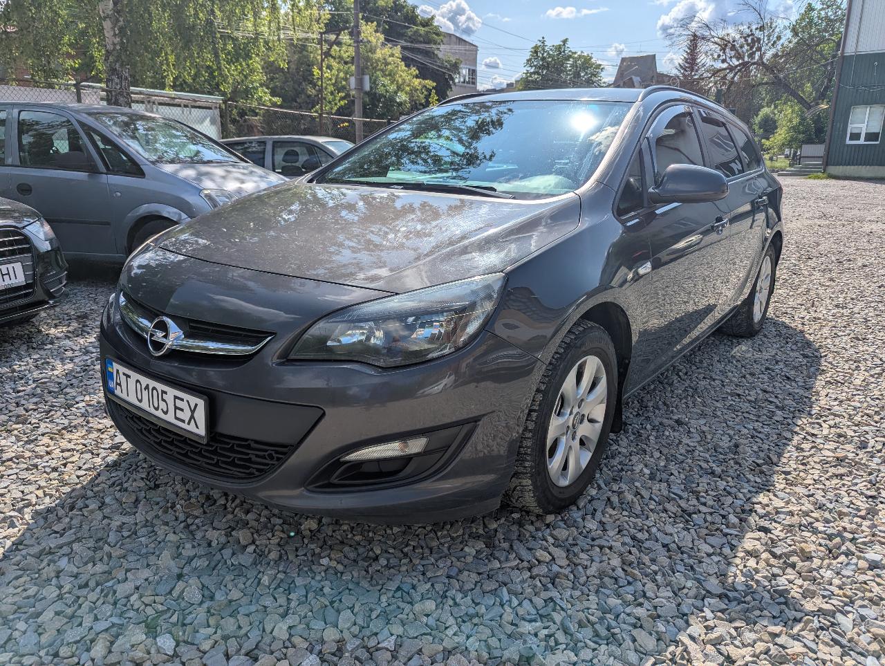 Opel Astra - фото 1