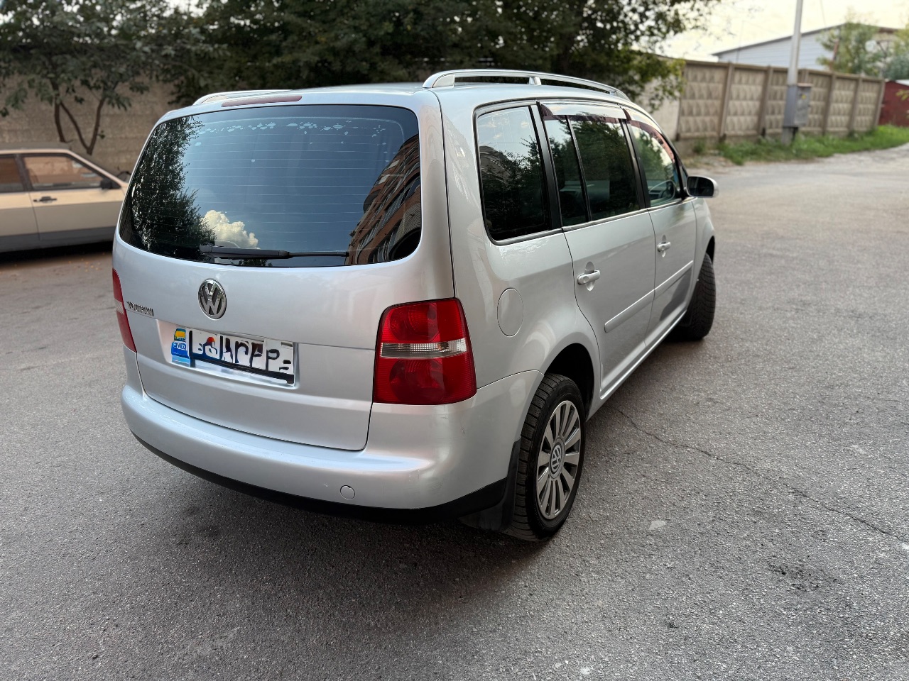 Volkswagen Touran - фото 7