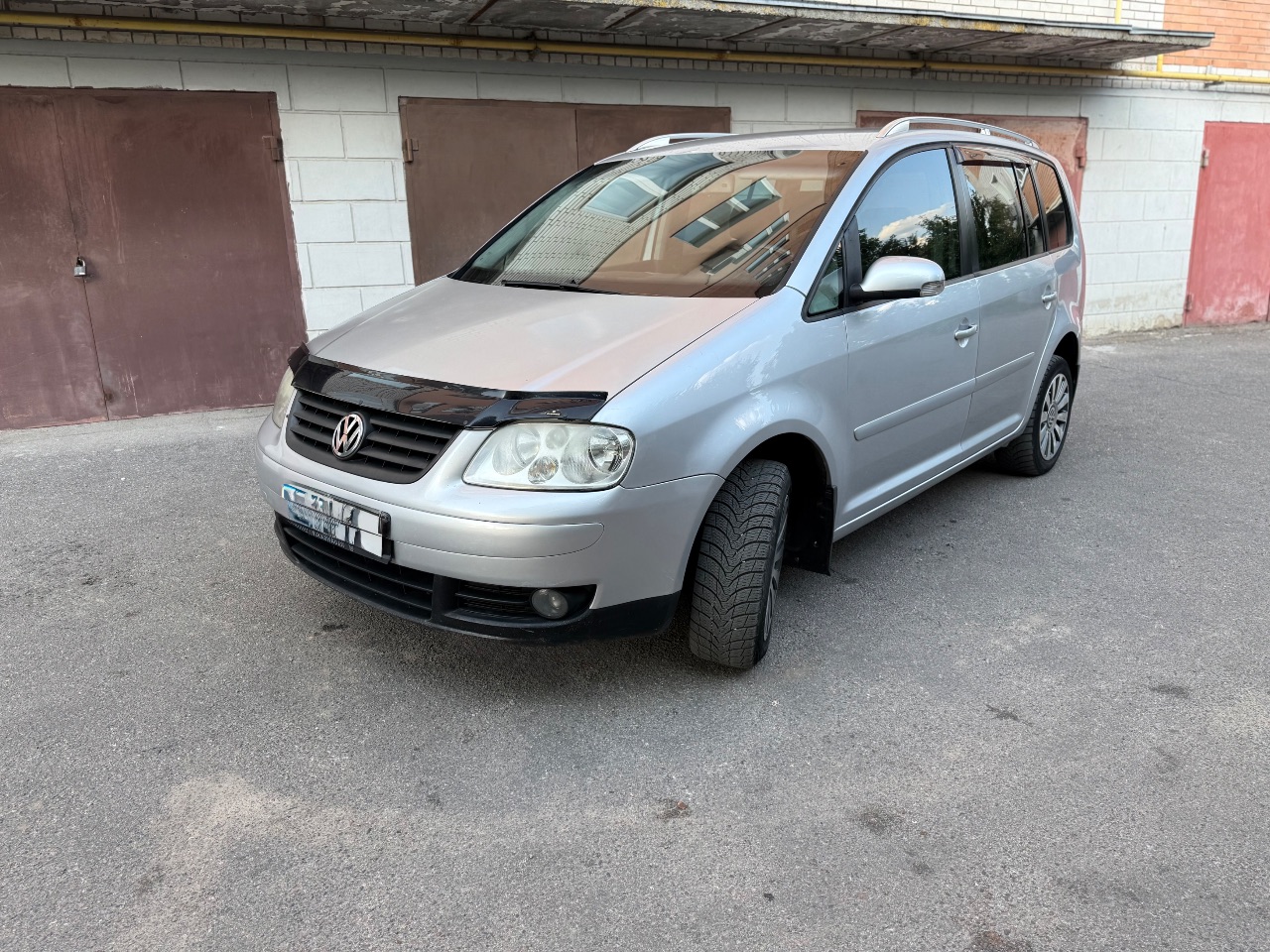 Volkswagen Touran - фото 3