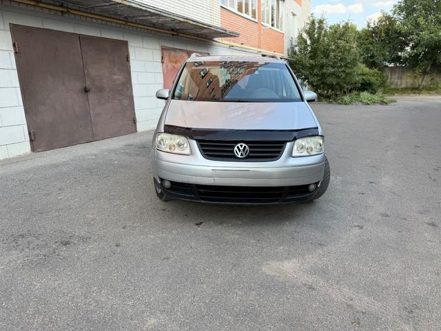 Volkswagen Touran - фото 2