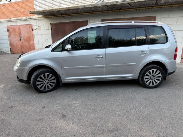 Volkswagen Touran - фото 4