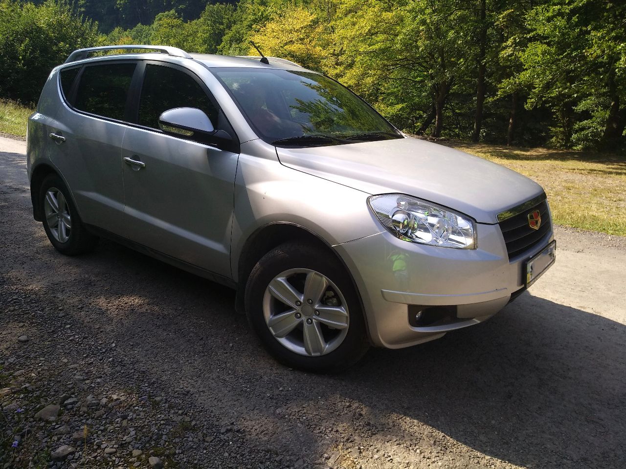 Geely Emgrand X7 - фото 1