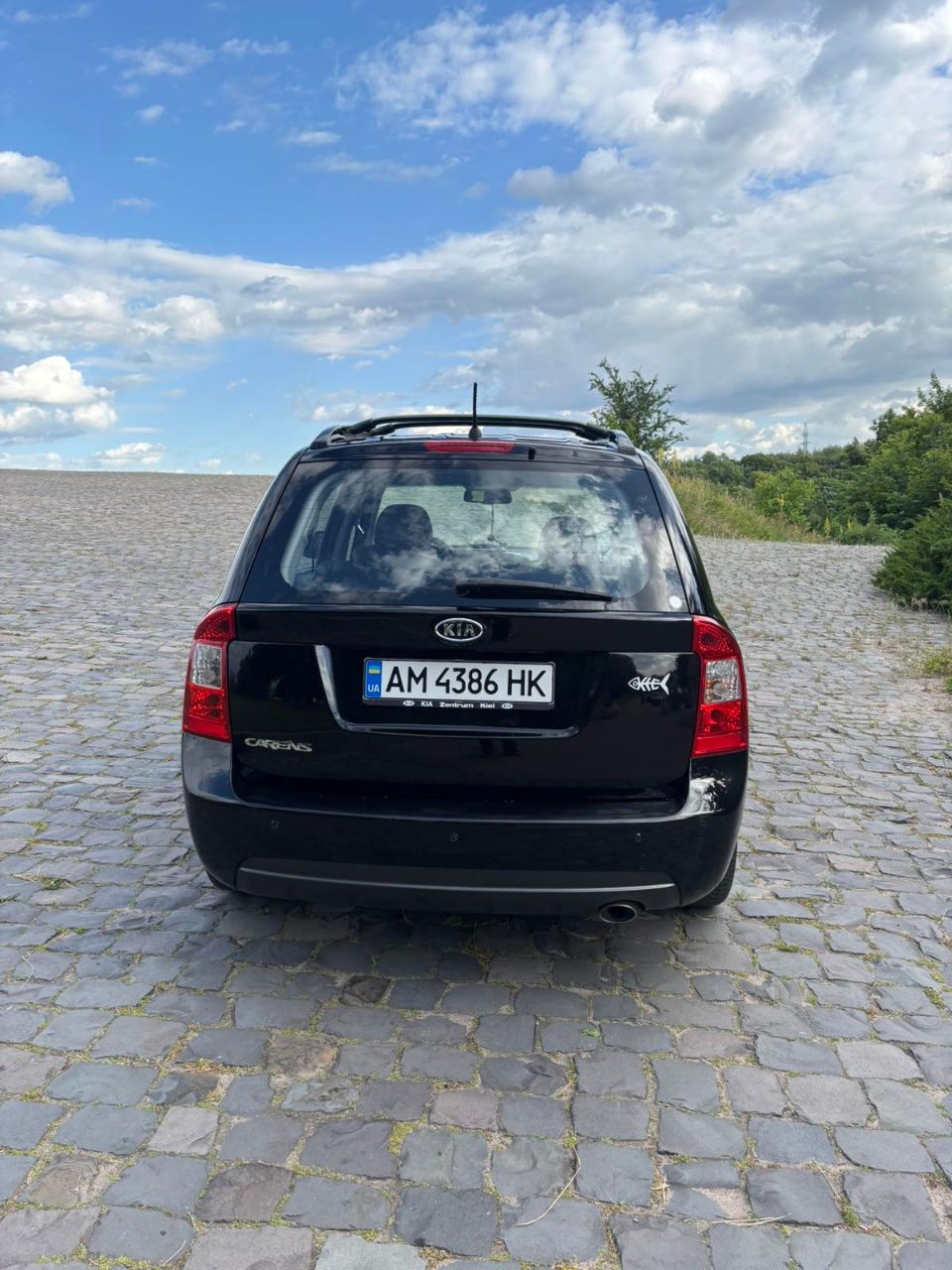 Kia Carens - фото 3