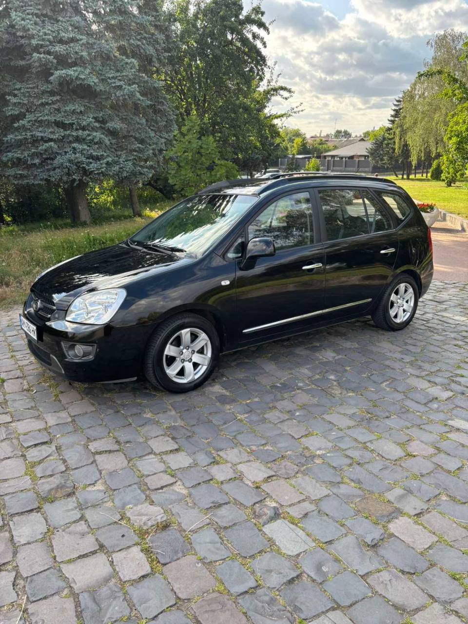 Kia Carens - фото 4