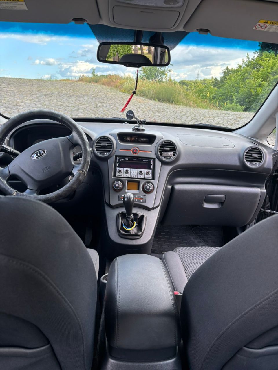 Kia Carens - фото 11