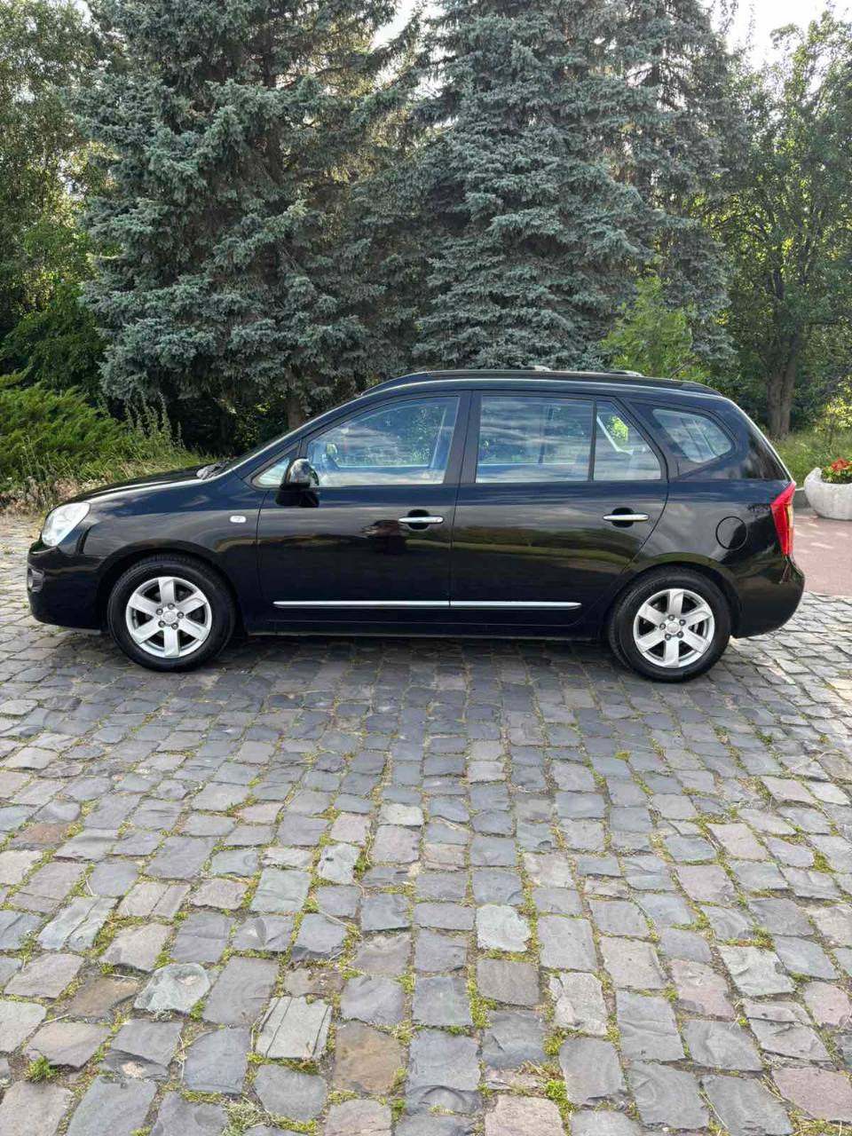 Kia Carens - фото 9