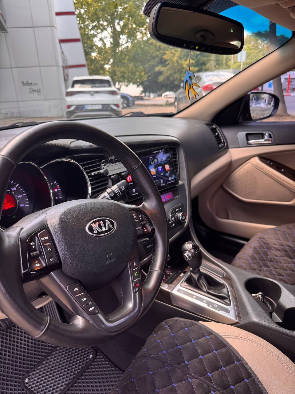 Kia Optima - фото 5