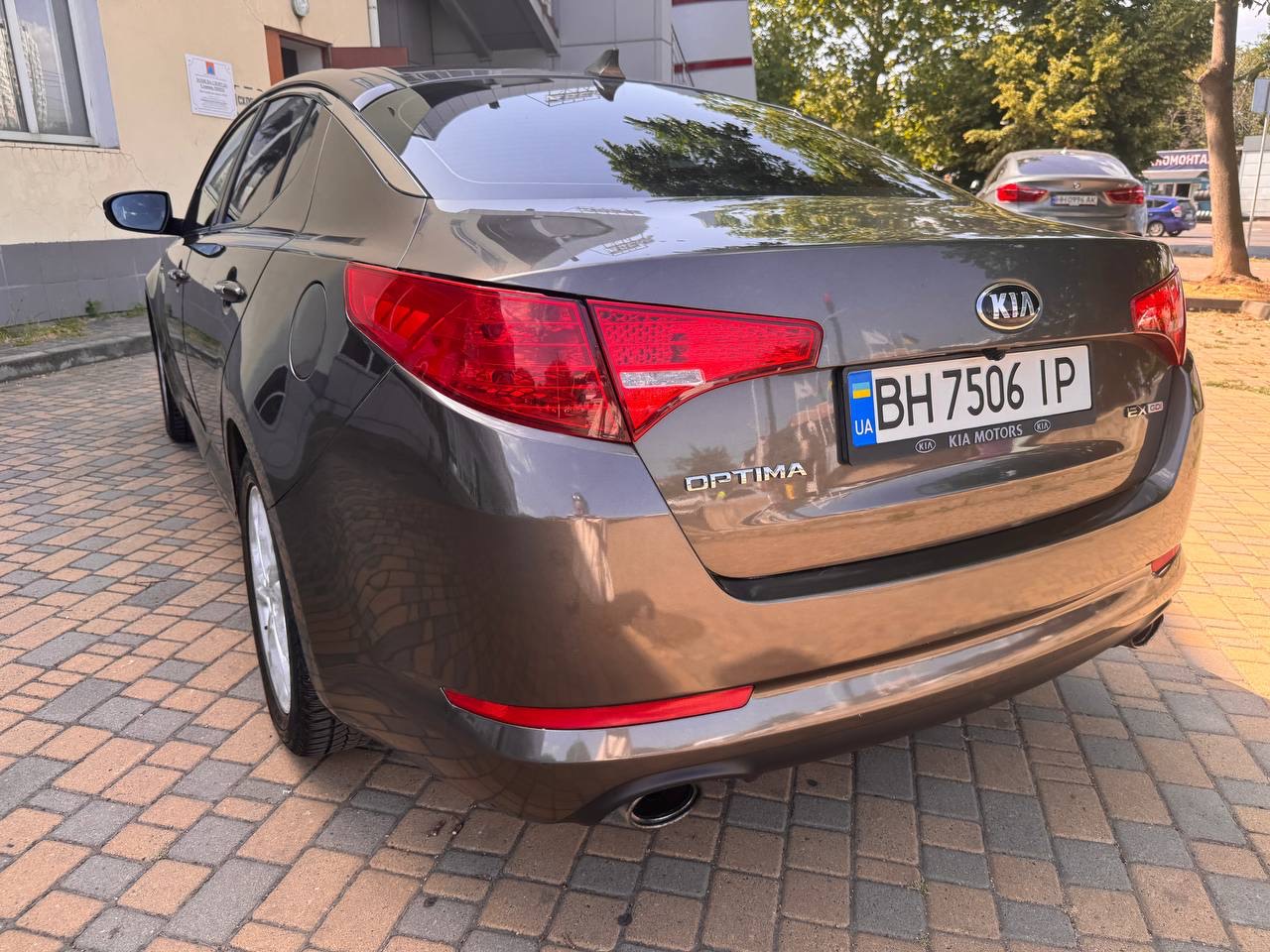 Kia Optima - фото 8