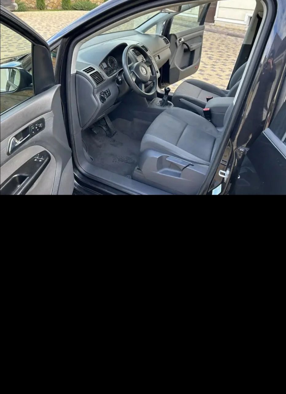 Volkswagen Touran - фото 7