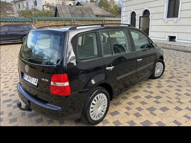 Volkswagen Touran - фото 5