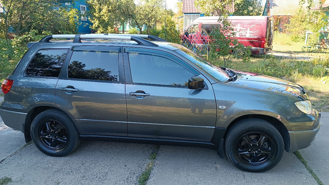 Mitsubishi Outlander - фото 9