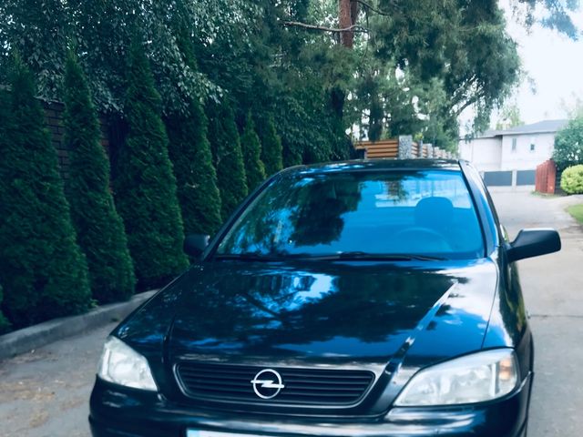 Opel Astra - фото 1
