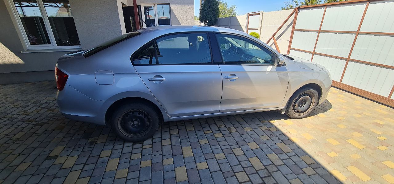 Skoda Rapid - фото 11