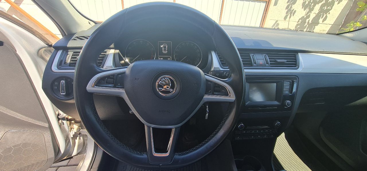 Skoda Rapid - фото 16