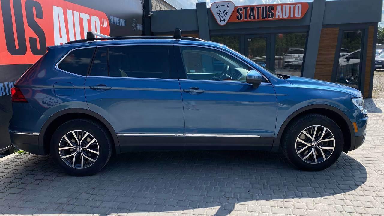 Volkswagen Tiguan - фото 4