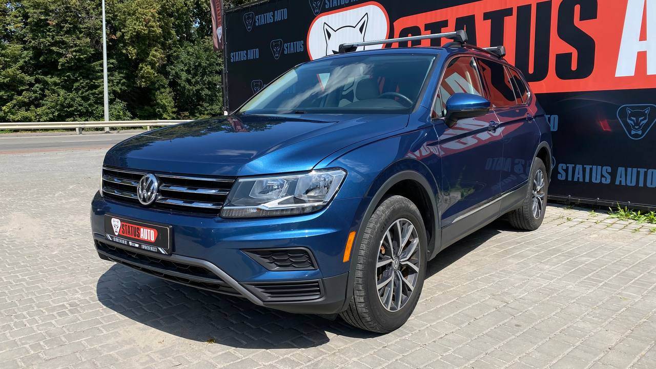 Volkswagen Tiguan - фото 1