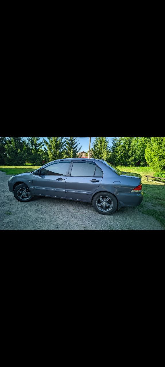 Mitsubishi Lancer - фото 3