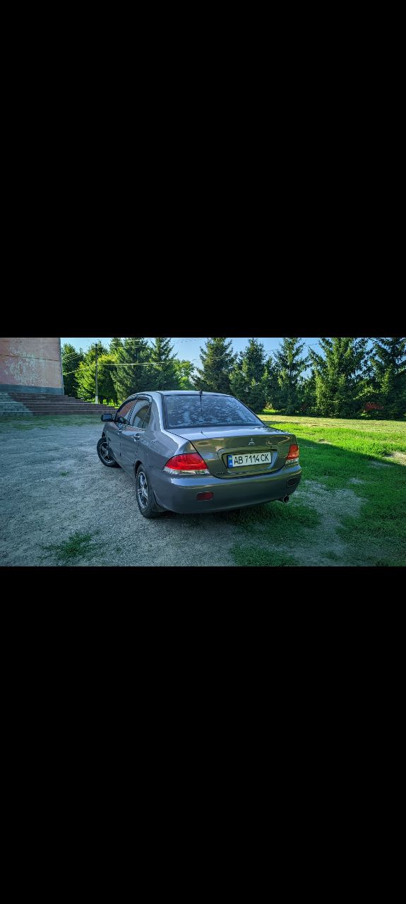 Mitsubishi Lancer - фото 4