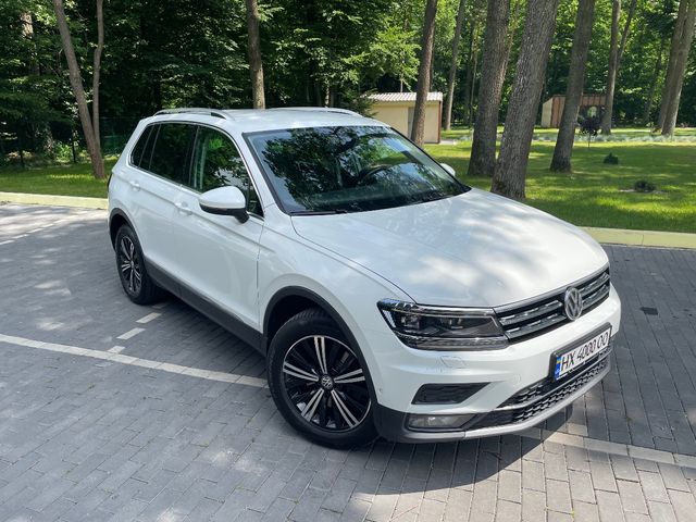 Volkswagen Tiguan - фото 1