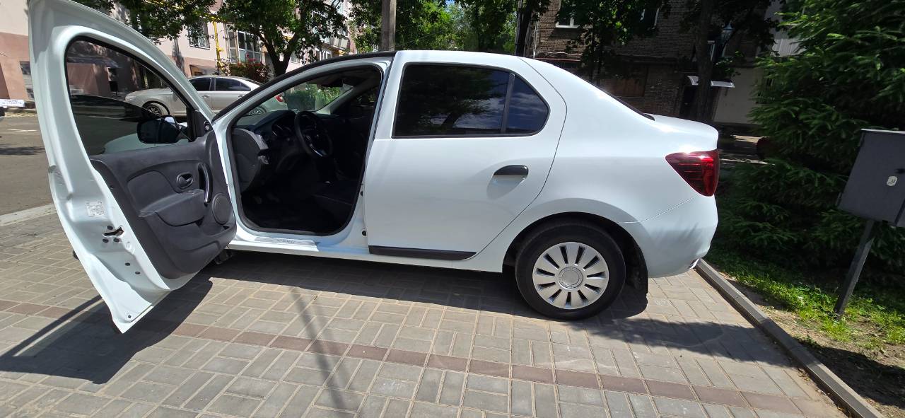 Renault Logan - фото 8