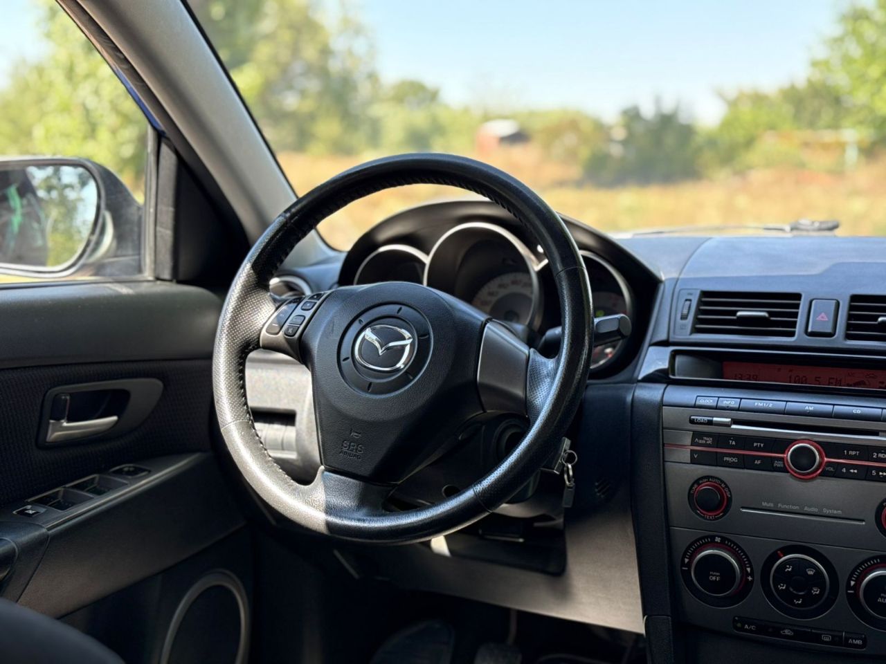 Mazda 3 - фото 11