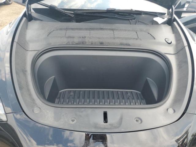 Tesla Model Y - фото 11