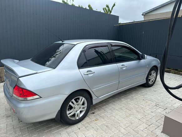 Mitsubishi Lancer - фото 3