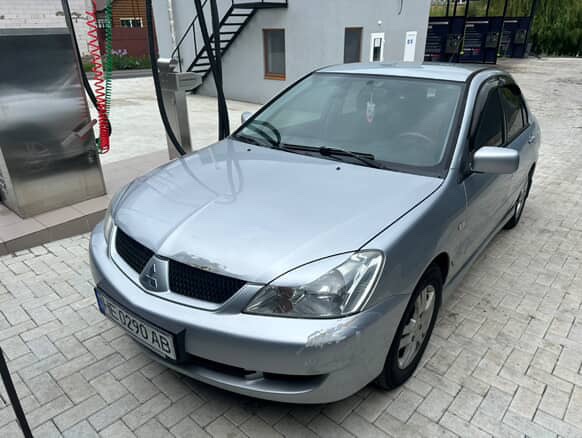 Mitsubishi Lancer - фото 4