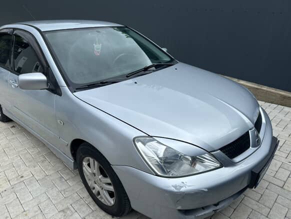 Mitsubishi Lancer - фото 1