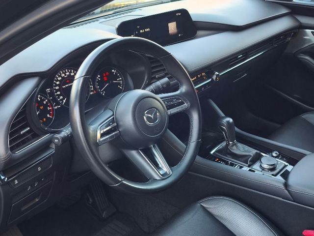 Mazda 3 - фото 5
