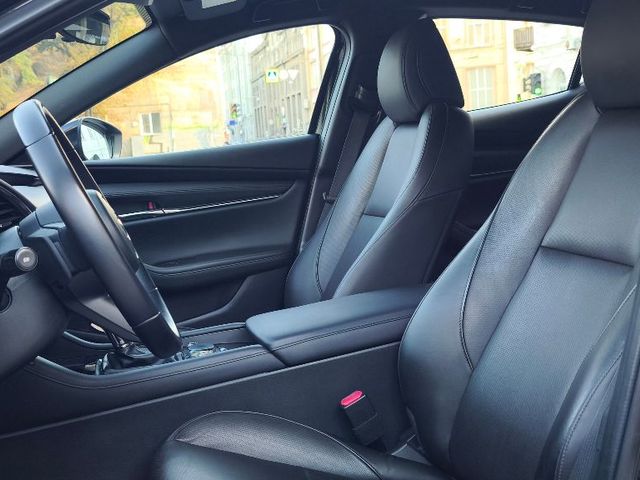 Mazda 3 - фото 4