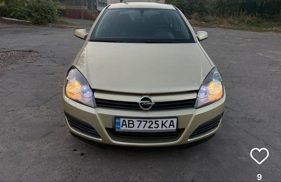Opel Astra - фото 1