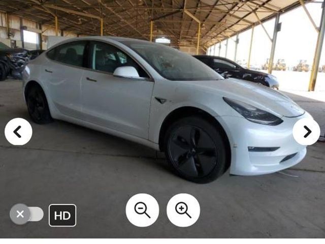 Tesla Model 3 - фото 1